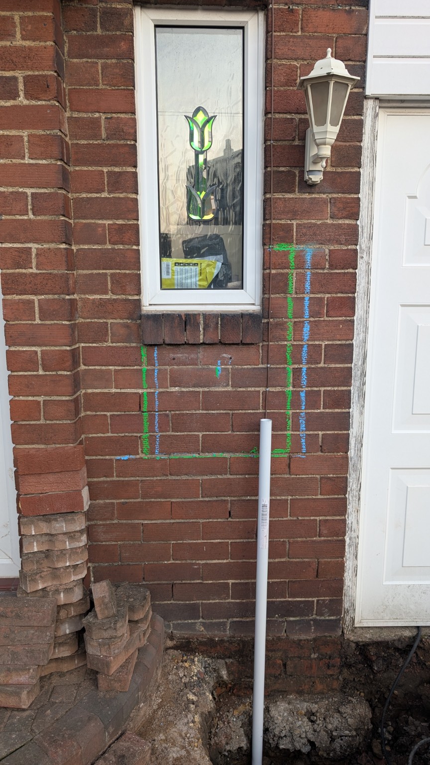 Setting out the new meter box position and cable route